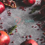 دانلود عکس انار روی زمینه خاکستری