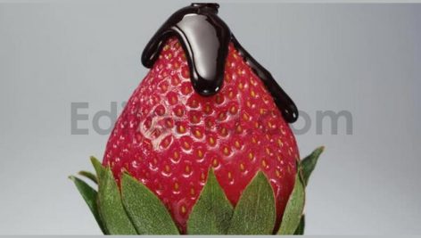 strawberries with green leaves spinning and poured